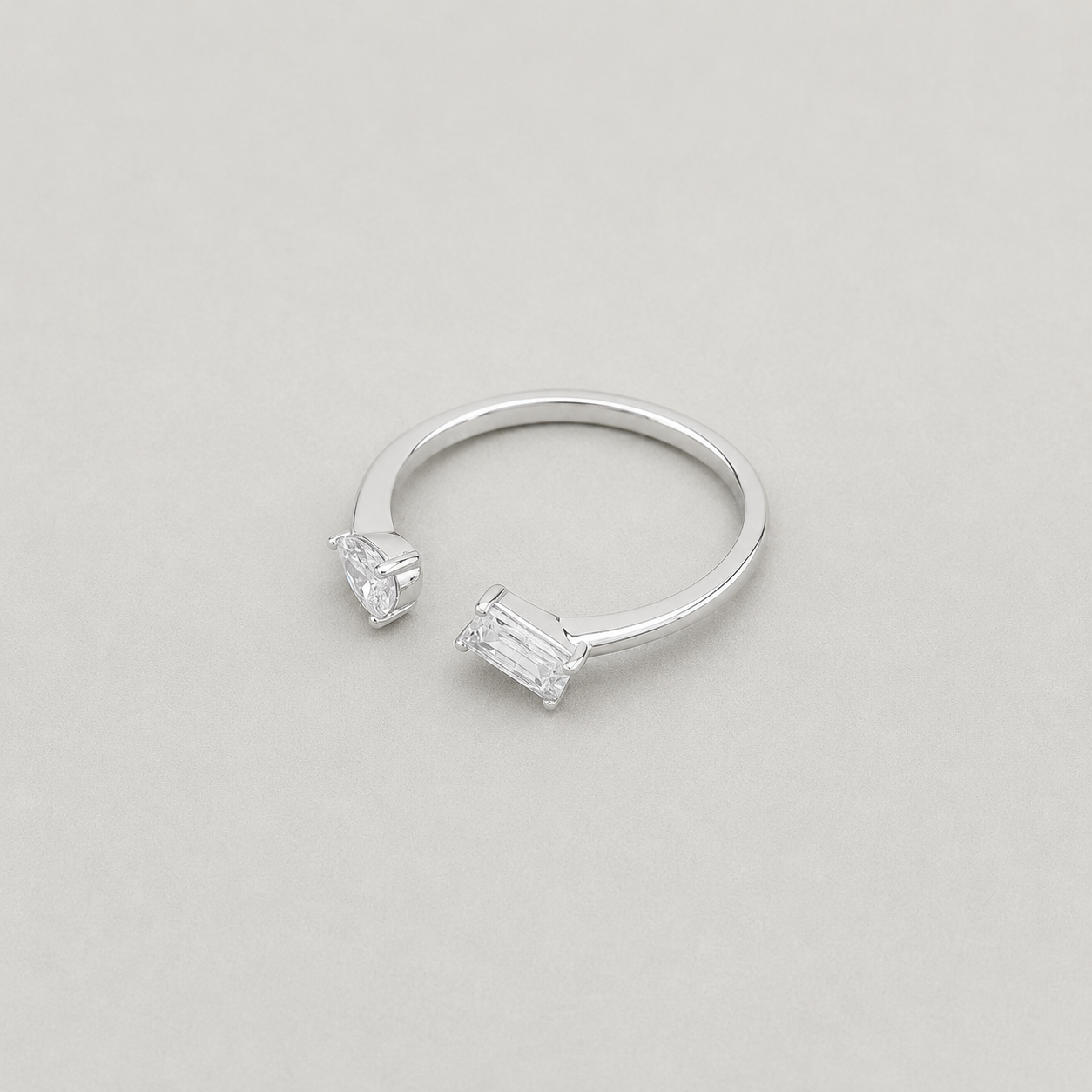 Pear and Emerald Cut Ring
