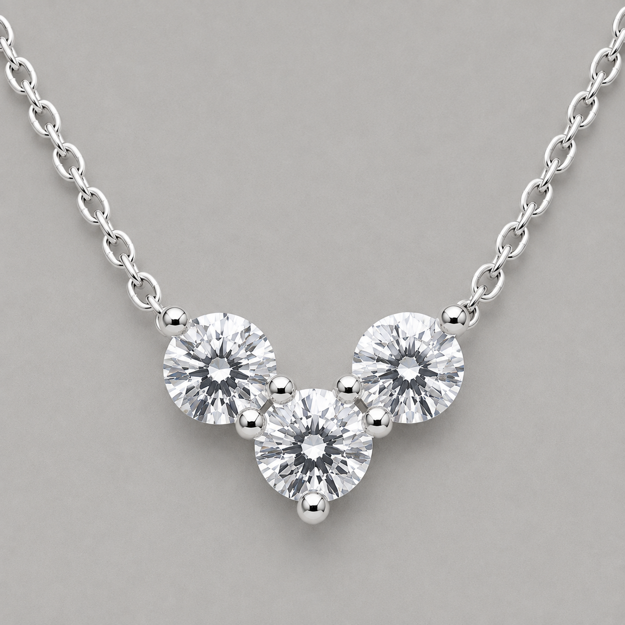 Modern Rhodium Tri-Stone Pendant