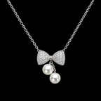 Ethereal Pavé Bow & Twin Pearl Pendant