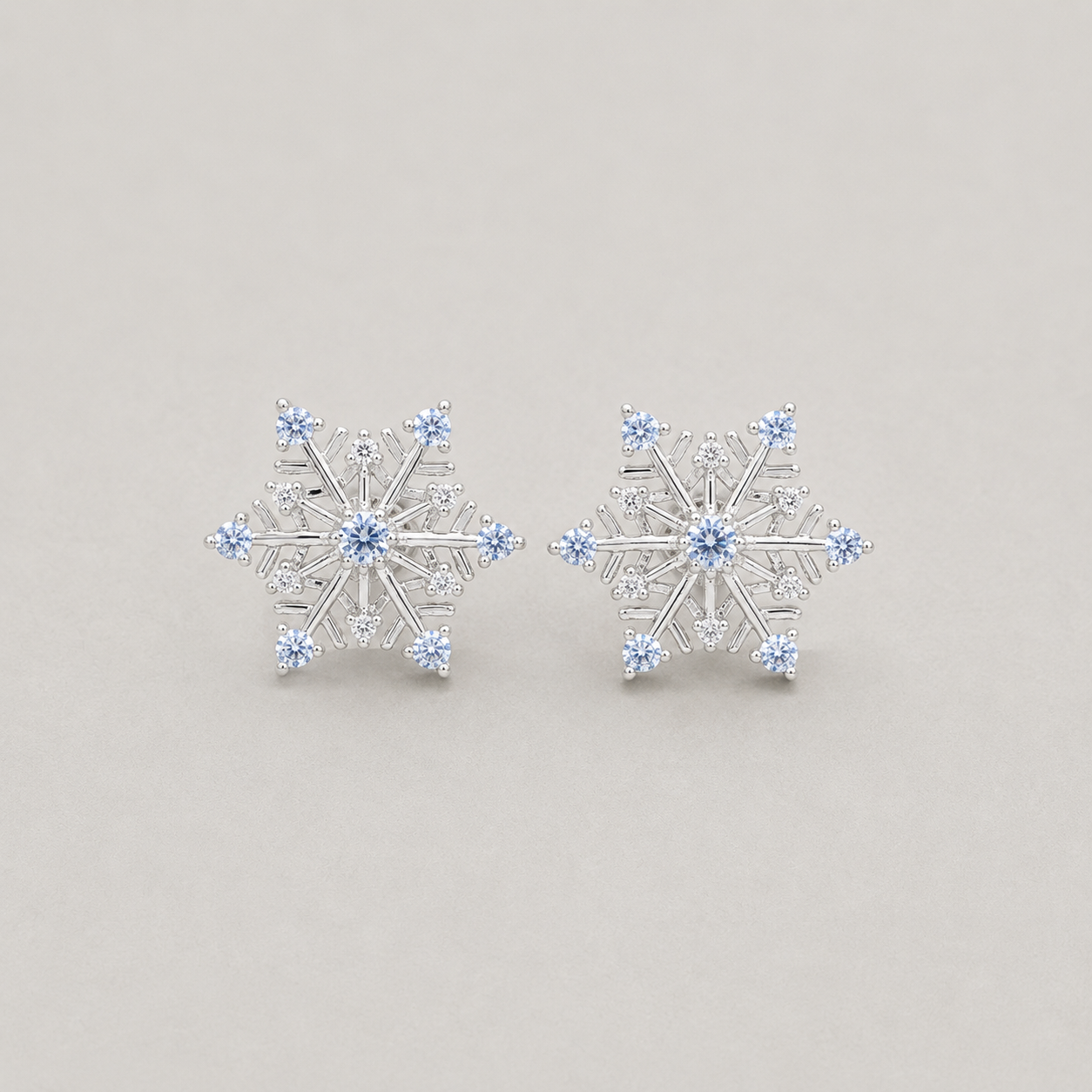 Snowflake Studs with Blue Accents