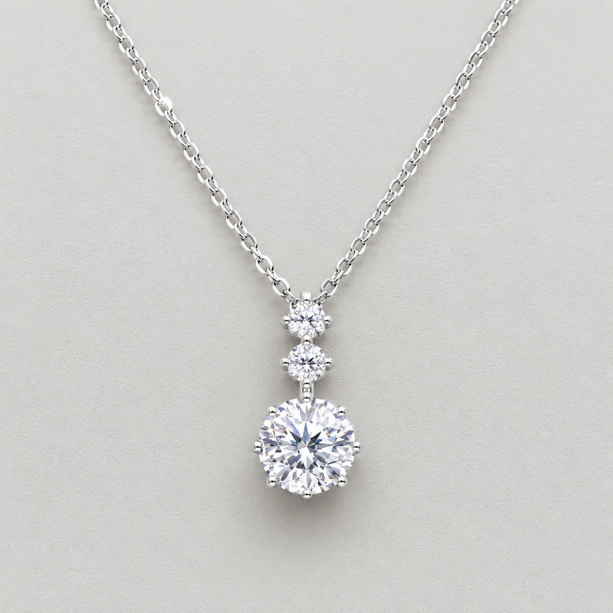 Radiant Triple-Stone Drop Necklace