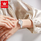 OLEVS 7093 Women’s Ceramic & Steel Watch – High Quality Luxury Classic Quartz Wristwatch Silver