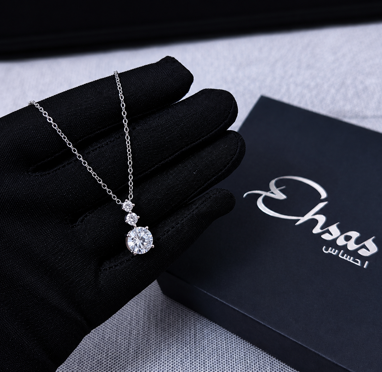 Radiant Triple-Stone Drop Necklace
